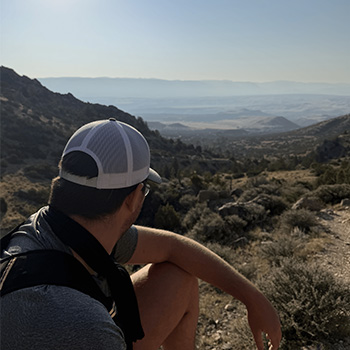 Photo of man on a mountain